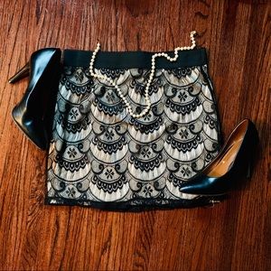 Black & Nude lace mini skirt